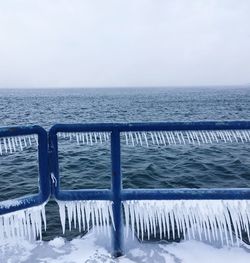 Scenic view of sea against sky during winter