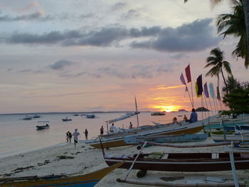 Scenic view of beach against sky during sunset