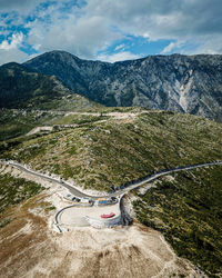 High angle view of road amidst mountains against sky