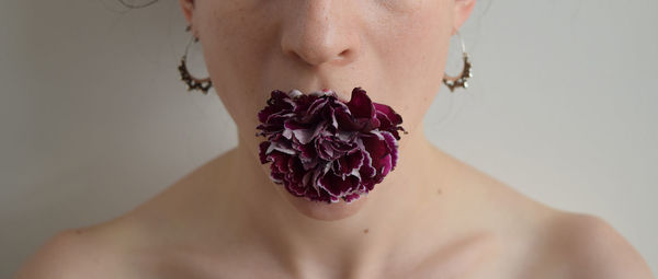 Close-up of hands over black background