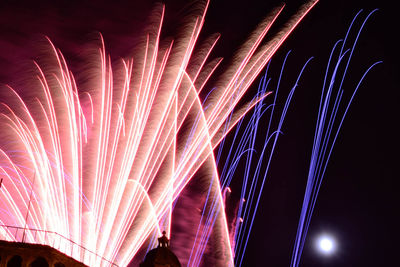 Low angle view of firework display