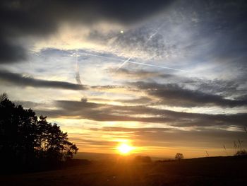 Scenic view of sunset over landscape