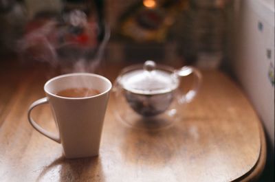 Close-up of coffee cup on table