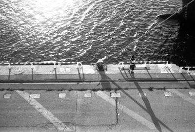 High angle view of people by sea