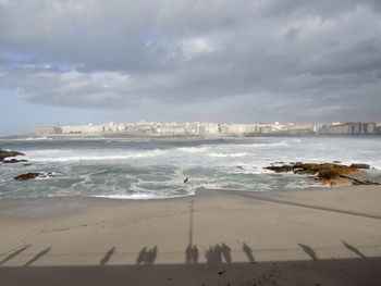 Scenic view of beach against sky