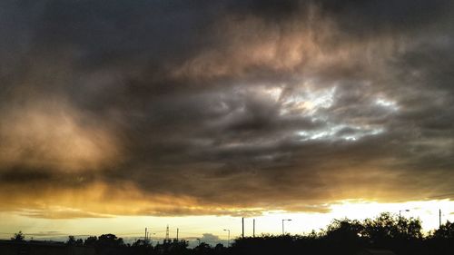 Scenic view of dramatic sky during sunset