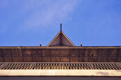 Low angle view of building against blue sky