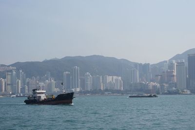 Ship in sea against clear sky