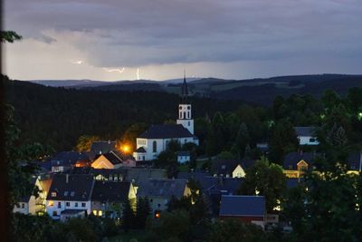 Church against sky at night