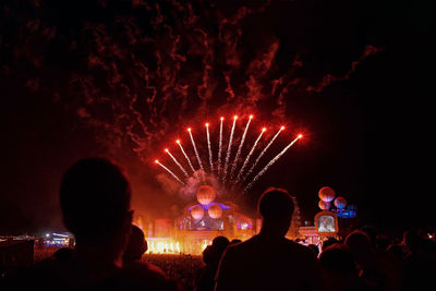 Rear view of people enjoying music concert