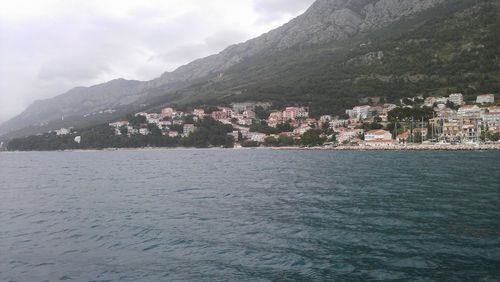 Town with mountain range in background