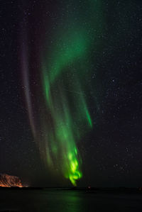 Scenic view of sea against sky at night