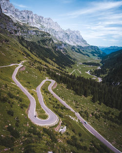 High angle view of winding road on mountain against sky