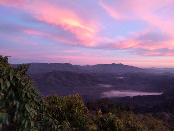 Scenic view of mountains against sky during sunset