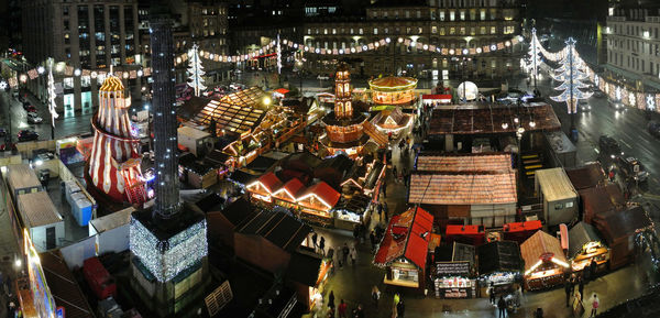 High angle view of illuminated buildings at night