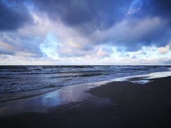 Scenic view of beach against sky