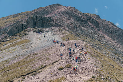 People walking on mountain