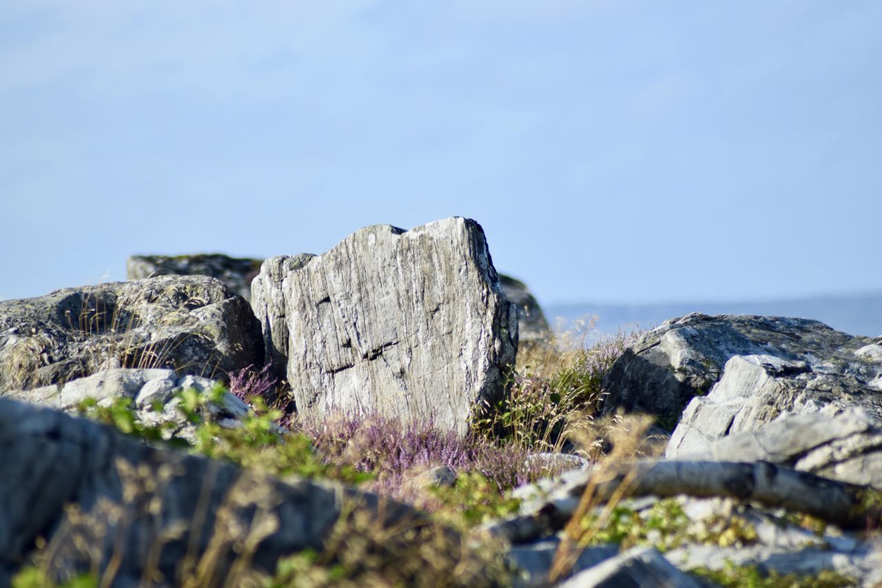 ROCKS AGAINST CLEAR BLUE SKY