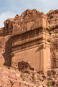 Low angle view of old ruins against sky