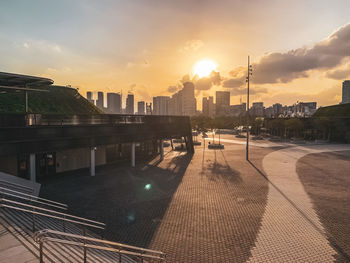 City buildings against sky during sunset