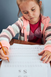 Girl studying at table