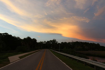 Empty road at sunset