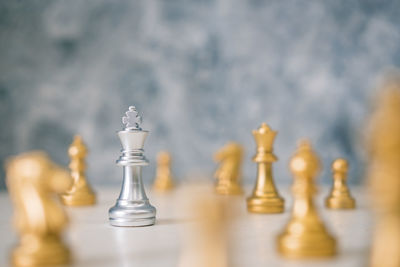 Close-up of chess pieces on table