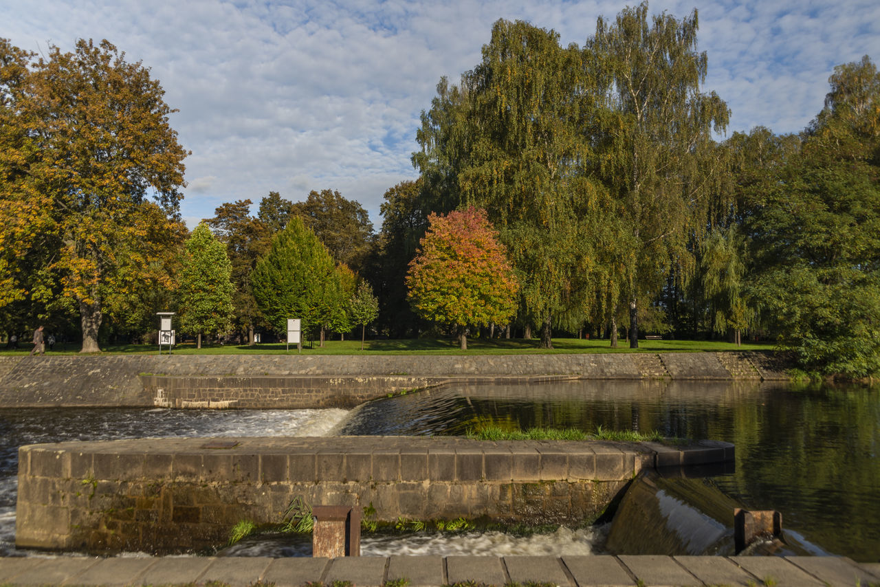 tree, plant, water, nature, autumn, sky, reflection, no people, lake, beauty in nature, tranquility, architecture, day, leaf, outdoors, scenics - nature, cloud, environment, tranquil scene, landscape, travel destinations, park, waterway, garden, growth, travel, park - man made space, tourism