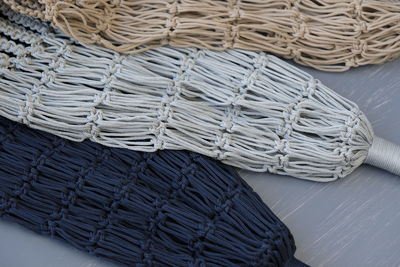 High angle view of knitted ropes on table