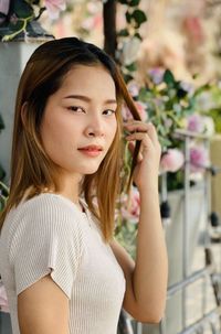 Portrait of young woman looking away