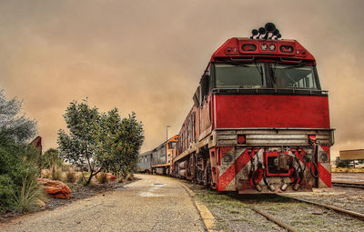 Train on railroad track against sky