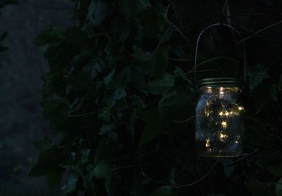 Close-up of illuminated lantern at night