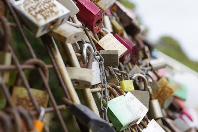 Close-up of padlocks on metal