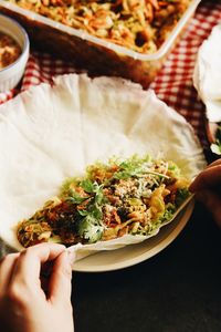 Midsection of person holding food