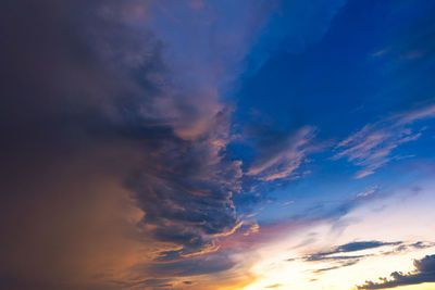 Low angle view of dramatic sky during sunset