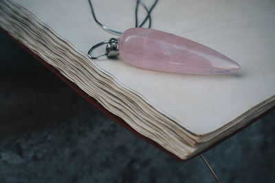 High angle view of heart shape on glass table