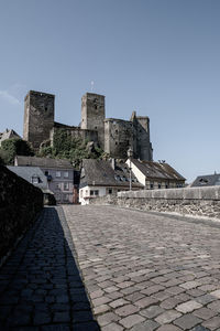 Old bridge to runkel castle in a small german town.