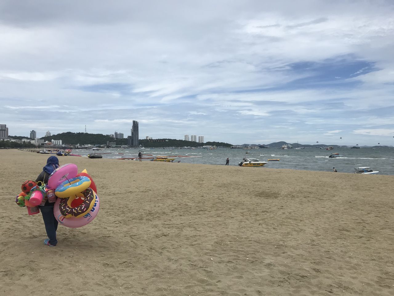 REAR VIEW OF WOMEN ON BEACH