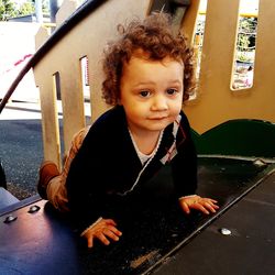 Portrait of boy playing at home