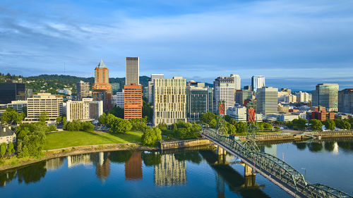 Buildings in city against sky