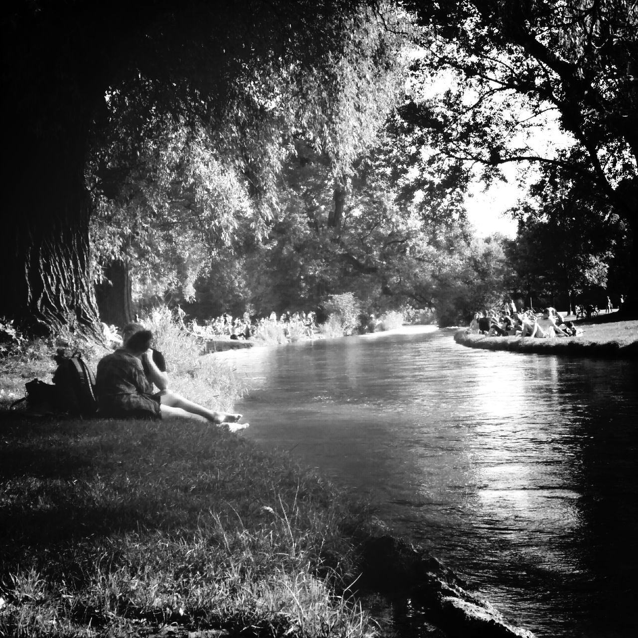 water, lifestyles, leisure activity, tree, lake, river, men, togetherness, bonding, sitting, boys, person, nature, childhood, girls, sunlight, tranquility