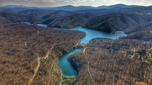 High angle view of river amidst mountains