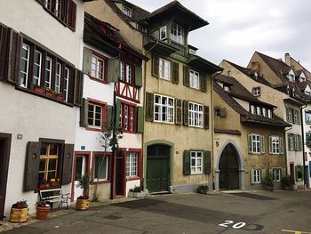 Street amidst buildings against sky