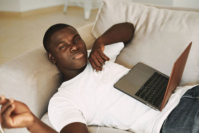 High angle view of man using mobile phone