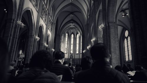 Rear view of people in traditional building