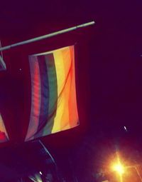 Close-up of multi colored flags