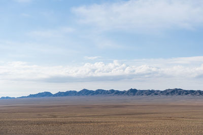 Scenic view of desert against sky