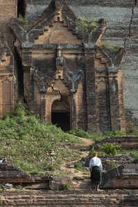 Rear view of a woman in a temple