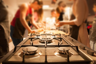 People working in kitchen