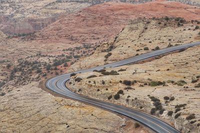 High angle view of road passing through land